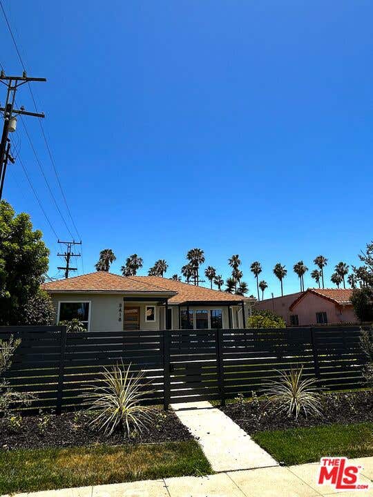 Photo of 5418 S Rimpau Boulevard, Los Angeles, CA 90043 (MLS # 26840063)