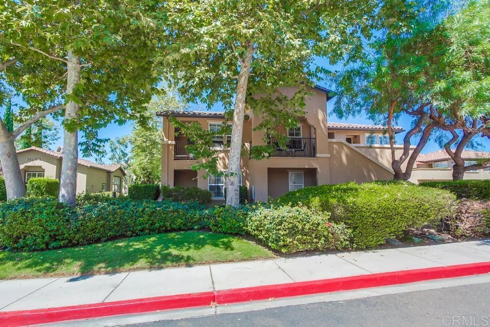 **Deed Restricted Unit** DO NOT CONTACT SDHC DIRECTLY. Buyer must meet income and qualifications guidelines. Welcome to this fabulous 1-bedroom, 1-bath upper unit condo, perfectly situated in one of the most desirable locations in the beautiful Sycamore Walk complex. This home is a true standout, featuring a light and bright layout with an open kitchen and newer carpet. You'll love the luxury of having two private balconies, perfect for relaxing or entertaining. The unit includes an in-unit laundry closet and a 1-car garage with an additional parking pass for added convenience. Enjoy the upscale community amenities, including a clubhouse and pool, all with the benefit of low HOAs. The location is unbeatable, placing you just minutes from parks, trails, shopping, dining, and excellent schools. For commuters, Highway 56 is just a short drive away.