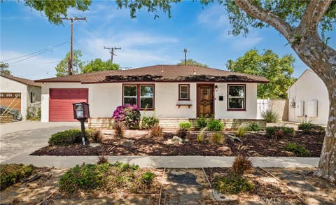 Photo of 4951 E Los Coyotes Diagonal, Long Beach, CA 90815 (MLS # RS26116010)