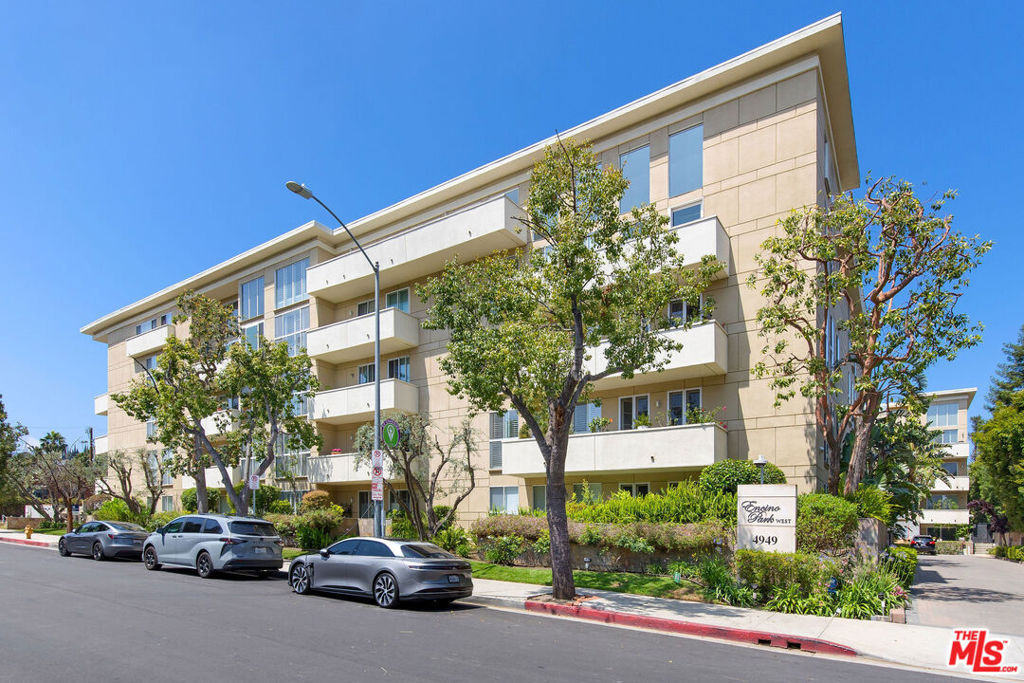 Welcome to Encino Park West, a distinguished full-service condominium community located at 4949 Genesta Avenue, in the heart of Encino. Unit #212A is a spacious two-bedroom, two-bathroom residence that offers more than 1,600 square feet of stylish and comfortable living space. The open-concept living and dining area creates a warm and inviting atmosphere. Step out onto your private balcony, perfect for relaxing or enjoying your morning coffee.The updated kitchen is outfitted with sleek white cabinetry, quartz countertops, and stainless steel appliancesideal for both everyday living and entertaining. The generously sized primary suite features a walk-in closet and an en-suite bath, complete with a luxurious shower and dual vanities for added comfort and functionality.Encino Park West provides a range of upscale amenities, including 24-hour concierge and security services. Residents can enjoy a heated pool and spa year-round, a fully equipped fitness center with saunas, and a recreation room complete with a full kitchen and library. Secure subterranean parking includes two assigned spaces, and elevators offer easy access to all levels of the building.The location is unbeatable directly across from Encino Park, which offers expansive green space and recreational facilities, and just a short walk to the vibrant shops, restaurants, and cafes along Ventura Boulevard. With convenient access to the 101 and 405 freeways and proximity to top-rated schools, including Encino Charter Elementary, this home perfectly blends luxury, lifestyle, and location.