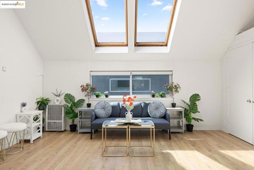 Bright, spacious, and extremely versatile, this generously-sized true live/work condo offers approximately 1,452 sq ft.* of thoughtfully designed space across multiple levels. With two separate entry doors and clearly defined zones, the property functions beautifully as two distinct units. The ground floor level-in workspace features a 2-room layout with a utility sink and half bath—ideal for an office, studio, or creative business. The upper-level living area, also open-plan but with a more residential feel, is filled with natural light and includes a fully equipped kitchen, a full bath, in-unit laundry, and a third-floor bedroom retreat with skylights and a walk-in closet. Enjoy the convenience of one deeded parking space and unbeatable proximity to Berkeley’s famed 4th Street district. Just moments from acclaimed restaurants, shops, boutiques and vibrant cultural experiences—with easy access to public transit and freeways—this condo offers the best of urban living and entrepreneurial independence. Enjoy the freedom to live, create, and thrive at this dynamic and eclectic residence. (*Sf per public records, buyers are advised to investigate permitted uses w/local zoning dept.)