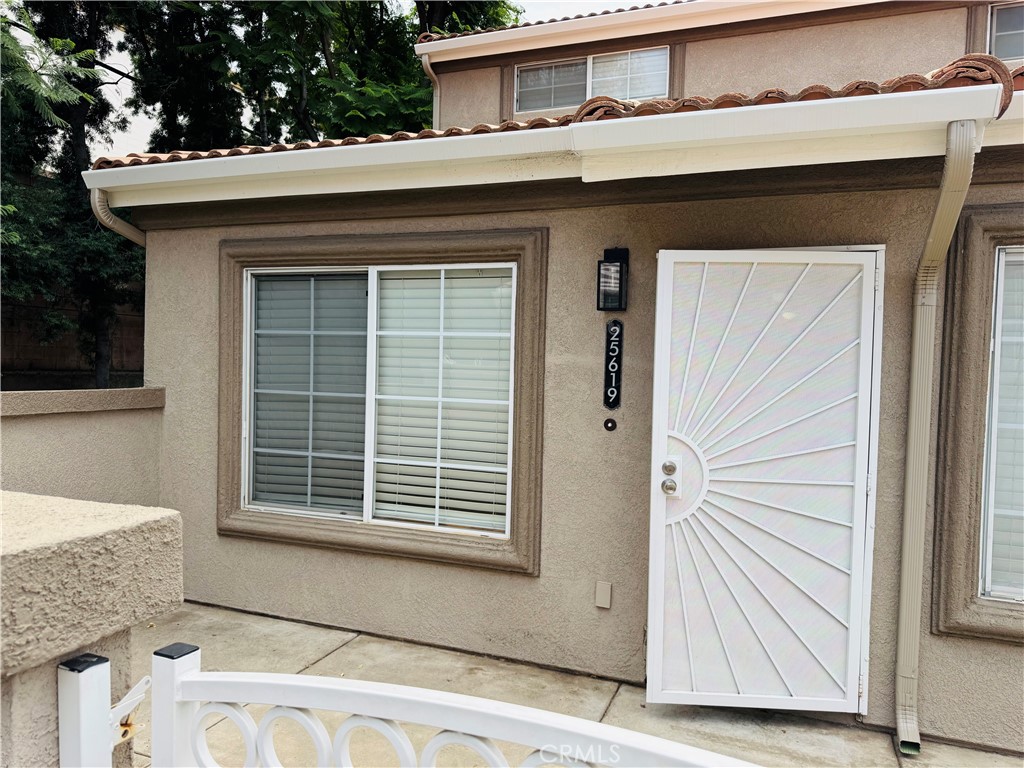 This is a wonderful end unit, ready for move in. It features 3 bedrooms, with 2 Master Suites upstairs and 1 bedroom and 1 bath on the main floor. The inviting family room has a fireplace and a separate dining area. Other features include a large kitchen, 2 car attached garage with washer and dryer in the garage as well. There is a front patio with its own gate at the entry. There is additional parking on Prospect Ave and additional guest parking near the garage. This unit is conveniently located in the Loma Linda community. The master bedroom and the bedroom upstairs have walk in closets.