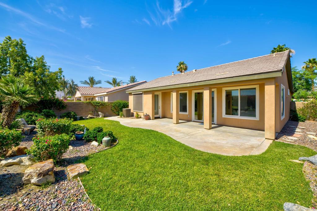 Amazing Value in Prime South La Quinta! Don't miss this upgraded Maurea Plan in the highly desirable resort community of Trilogy at La Quinta. This light-filled 2 bedroom, 2 bath home offers tremendous curb appeal with its charming Tuscan exterior and a thoughtfully designed open floor plan that blends comfort and style. Perfect for indoor-outdoor living, the great room flows seamlessly to the covered patio and private backyard retreat--ideal for entertaining or simply unwinding. The chef's kitchen is a true highlight, boasting granite countertops, abundant cabinetry, walk-in pantry, and a rare custom built-in double oven. The oversized primary suite provides a private escape with dual closets, dual vanities, a walk-in shower, and direct patio access. Additional upgrades include a cozy gas fireplace, tile flooring in the main living areas, fresh carpet in the bedrooms, new paint, custom window coverings, and more. With its excellent location, move-in-ready condition, and resort-style amenities just beyond your doorstep, this home is an exceptional opportunity in South La Quinta. This home offers exceptional value within Trilogy, a premier gated community with world-class amenities including a fitness center, indoor walking track, resort and lap pools, pickleball and tennis courts, an art studio, game room, banquet facilities, and championship golf coarse which hosted the 2003-2006 Skins Games. All of this surrounded by the stunning backdrop of the Santa Rosa Mountains. Don't miss this opportunity to own one of the best-priced homes in Trilogy at La Quinta.