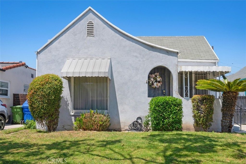 Photo of 1847 W 68th ST, Los Angeles, CA 90047 (MLS # SW26106121)