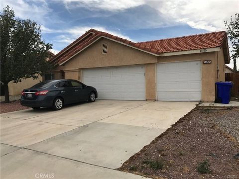 Photo of 14570 Juniper Ln, Adelanto, CA 92301 (MLS # CV26047826)
