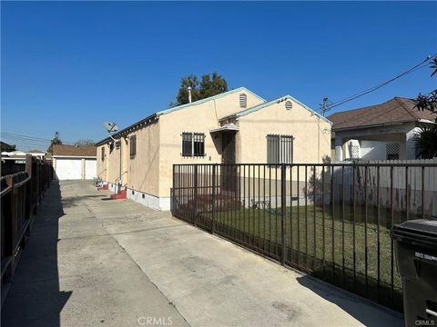 Photo of 1667 E 111th St, Los Angeles, CA 90059 (MLS # CV26014986)