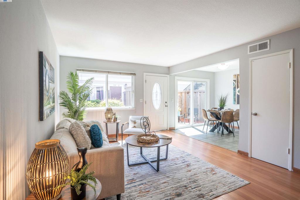 Beautifully updated 2-story, 2-bedroom, 1-bath condo in a quiet Milpitas neighborhood! This move-in ready home features easy-care hard-surface floors, dual-pane windows and sliding doors throughout, and a light-filled layout. The modern kitchen offers upgraded white cabinetry, brand new quartz countertops, a gas stove, oversized Stainless Steel sink with new pulldown faucet and updated appliances. Fresh interior paint and a brand new bathroom vanity with new light fixture and faucet complete the clean and contemporary look. Enjoy a private patio—perfect for relaxing or entertaining. HOA fee includes WATER (including HOT WATER) and TRASH, plus access to a large pool, clubhouse, playgrounds, greenbelt and shared laundry. 1-car garage and 1-car driveway parking included plus street parking. An ample exterior secured Storage Room is included and assigned to this home for your additional storage needs. Prime location with walking distance to restaurants and shops; minutes to major freeways (I-680, 237, 880) and near major tech companies, San Jose Airport, McCarthy Ranch, The Great Mall, and top-rated schools. Don’t miss this move-in ready gem in one of Silicon Valley’s most convenient locations!