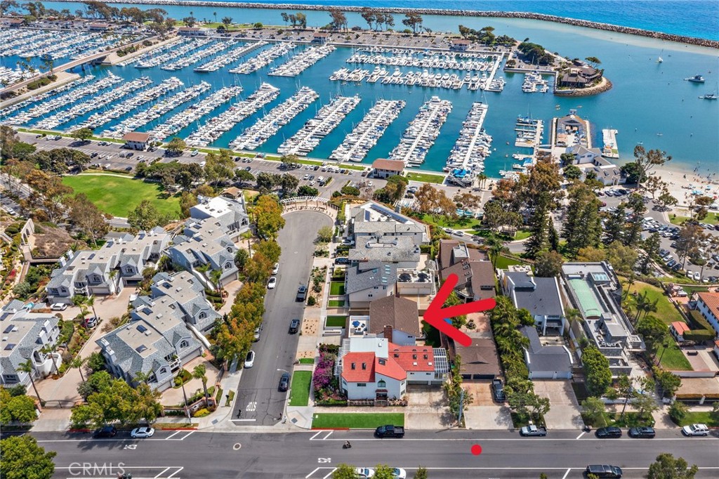 Stunning ocean-view deck!! Perched on a peaceful cul-de-sac overlooking Dana Point Harbor, this beautifully fully remodeled, fully furnished 4-bedroom, 2.5-bath home perfectly blends modern comfort with relaxed coastal charm. Located in the heart of the Lantern District, you’re just a short stroll to Dana Point Harbor, sandy beaches, restaurants, and coffee shops — the ultimate Southern California getaway.
This upscale, modern remodel features stylish touches throughout, including soothing coastal tones of blue and gray, sleek vinyl flooring, recessed lighting, and ceiling fans. The open-concept kitchen is designed for both entertaining and everyday living, with bar-style seating and a clear view into the spacious living room and backyard. The kitchen also comes fully equipped with upscale stainless-steel appliances, combining form and function for a chef-inspired experience. A separate formal dining area offers an elegant space for special gatherings.
Relax in generously sized bedrooms, each with unique charm. The primary suite is a true retreat, featuring a cozy fireplace and an oversized balcony to soak in breathtaking sunsets and ocean views. Bathrooms are thoughtfully upgraded with motion-sensor, lighted mirrors for added convenience and style.
Bedroom Setup:
• Primary Suite: King-sized bed, private balcony with breathtaking ocean views, ceiling fan, smart TV, en-suite bathroom
• Bedroom 2: Queen-sized bed, ceiling fan – cozy and inviting
• Bedroom 3: Bunk bed (twin over full), ceiling fan – perfect for kids or extra guests
• Bedroom 4: Three twin beds, ceiling fan and Smart TV – bright and comfortable
Additional highlights include a fully equipped laundry room, two fireplaces, and a fully fenced backyard perfect for barbecues and relaxation. For parking, enjoy a 2-car garage, driveway parking, and plenty of additional street parking.
Whether you’re planning a relaxing beach getaway, a working vacation, or a longer stay to enjoy the best of coastal living, this home offers everything you need for an unforgettable Dana Point experience.