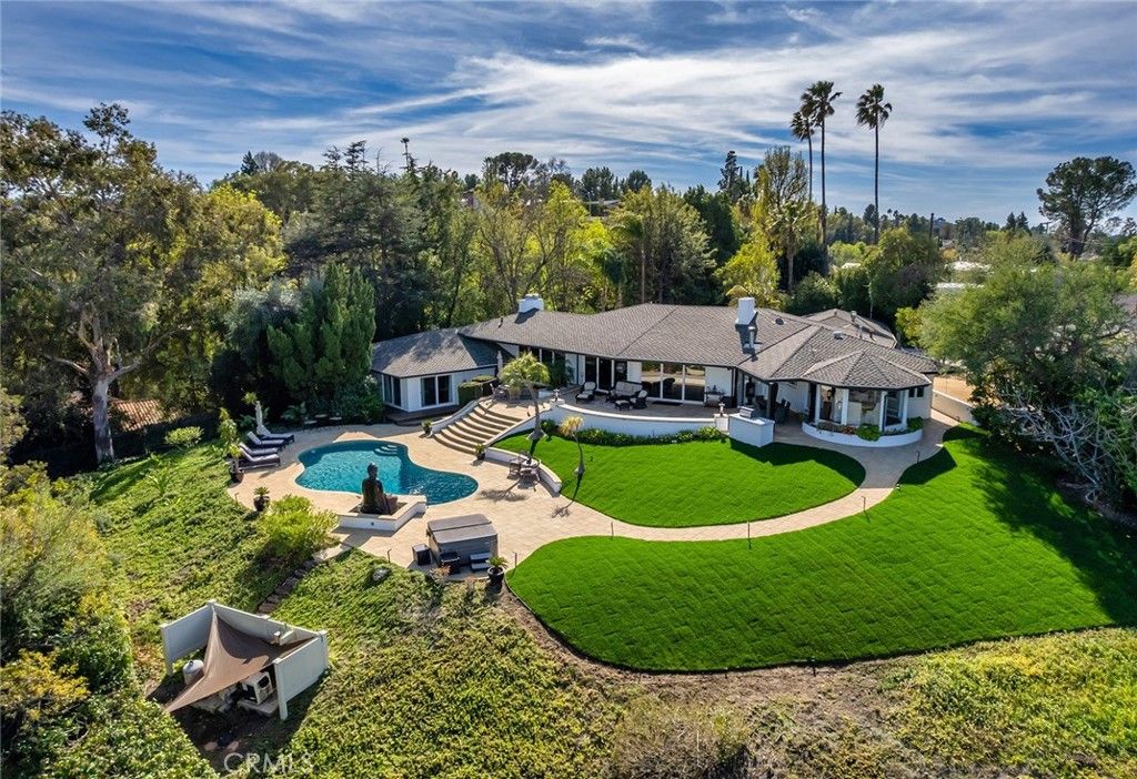 Photo of 4854 Nomad Drive, Woodland Hills, CA 91364 (MLS # SR25222767)