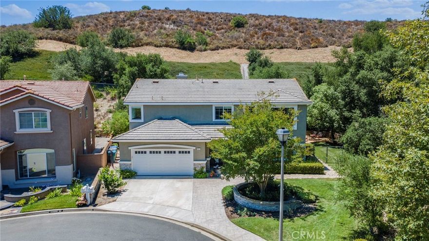 Welcome to your dream home in a serene gated community of Stonecliffe! Nestled on a rare, almost 12,000 sq ft park-like lot, a beautifully updated 4-bedroom house with a large open loft, 2.5 bathrooms & a 3-car tandem attached garage, offers the perfect blend of luxury, space, and privacy. With only one neighbor and no one behind, enjoy peaceful living and picturesque views from nearly every window.



Situated on a cul-de-sac street with an incredible & expansive yard, framed by mature trees.  The covered front porch exudes charm & would be a great place to sit while children or pets play. 



Once you enter through the fabulous Dutch door, you’ll find soaring high ceilings, crown molding, plantation shutters, and beautiful yet low-maintenance porcelain wood-look floors. The open and versatile floor plan is ideal for entertaining, featuring a gorgeous, remodeled kitchen with quartz countertops and cabinetry that extends to the ceiling, a cozy fireplace, ceiling fans, newer A/C & solar. All bathrooms have been thoughtfully renovated, including dual sinks, walk-in showers, and a soaking tub.



Upstairs, a convenient laundry room with extra linen storage, generous-sized bedrooms, and a large open loft. The three-car tandem garage provides ample space for vehicles and storage, making this floor plan incredibly versatile.



Step outside and fall in love with the expansive, private backyard — an entertainer’s dream with a built-in BBQ, 2-burner range & a large covered aluminawood patio cover, with enough space for a pool and an ADU!  This home truly has it all.



Don’t miss your opportunity to own this private oasis with luxury finishes and room to grow!