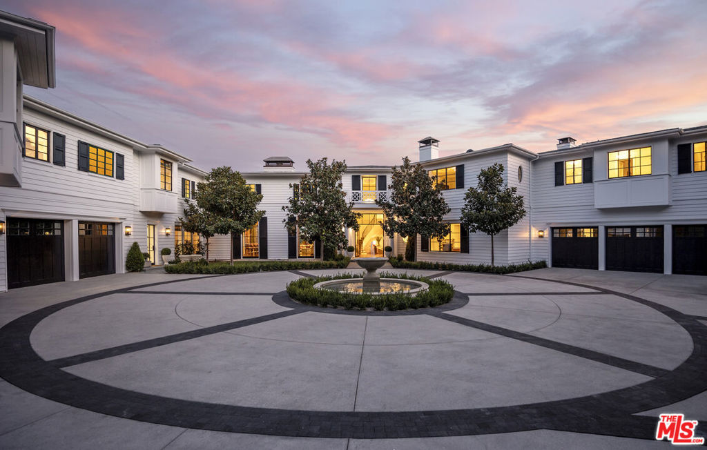 "The Bellagio Estate". Gracious Traditional, 19,700sqft+ of tasteful and handcrafted design. Years in construction, this gem is a showplace for art and high design. Over 1.1 acres in the heart of Bel Air offering privacy and stunning views of golf course and city beyond. Primary bedroom suite is the ultimate retreat with sitting room, double baths and closets that rival the finest retail stores. 7 secondary bedrooms and an additional 2 bedroom staff suite make this optimal for large groups. Ideal for entertaining on a grand scale, the estate offers main show kitchen, full catering kitchen and 2 additional kitchens (staff and guest house). Secure up gated driveway, ample parking in large motor court and back service entrance with additional parking. Exquisite grounds include vast main lawn with infinity edge pool and exceptionally beautiful pocket gardens throughout. Rare combination of scale, quality and location. A+ in every way.