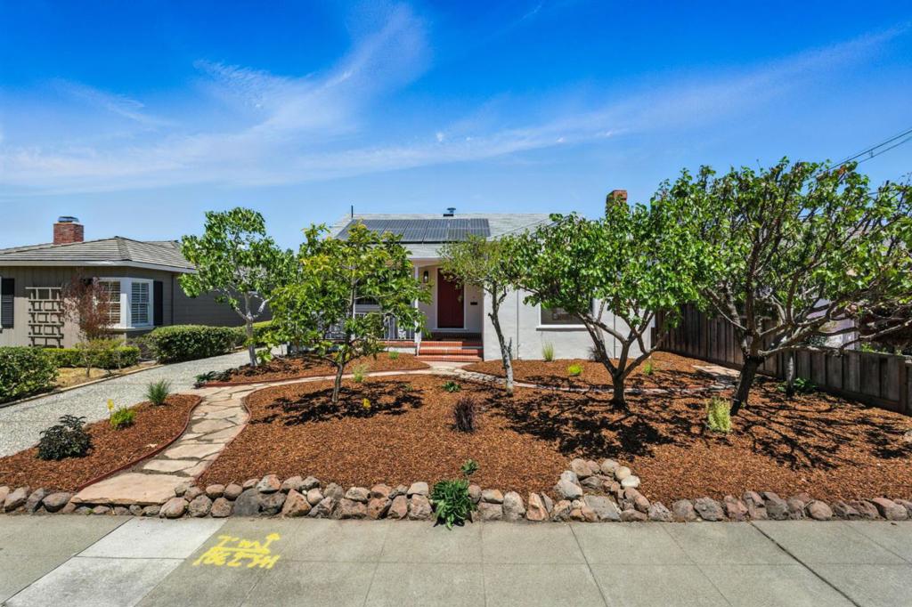 Welcome to this sunny 1580 SF 3-bed, 2-bath home located in the sought-after Husing Estates area of SM. Great curb appeal, inviting front porch, lovely entry into an expansive, high-ceiling living room with recessed lights & a wood-burning fireplace, plus a large light-filling picture window. Spacious remodeled kitchen offers an abundance of cabinetry and counter space, plus a six-burner gas cooktop and opens to a generous dining area for today's lifestyle. A dedicated mud room right off the kitchen with a full-size washer and dryer offers easy access to the detached, oversized two-car garage. The large primary bedroom boasts a sliding door to a private rear deck and a flat, fenced yard. A large primary bath offers two sinks, a separate shower, and a tub. Large hall bath with shower over tub accommodates the two additional generous bedrooms. Recently refinished floors & new durable laminate. Sweet private fenced flat rear yard, and an abundance of fruit trees, central forced air, owned solar panels, fresh interior & exterior paint, + recessed lighting. Near award-winning Baywood, Borel, and Aragon. Additional amenities just a short distance include Central Park, Hillsdale Mall, Bridgepointe, DT SM restaurants, & Trader Joe's, plus easy access to commute corridors. Move right in!