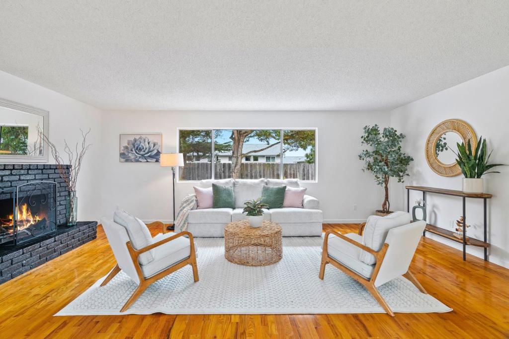 Looking for that classic 1960s charm with modern updates? Welcome to 274 Cosky Dr in Marina, CA - just over a mile from the beach! This 3-bed, 2-bath home features original hardwood floors, fresh interior paint, and a brand new roof. The spacious living room includes a cozy fireplace and a flex space perfect for dining or reading. The kitchen has updated flooring, painted cabinets, and a sunny dining nook. Outside, enjoy a spacious backyard with a concrete patio, spa, and room to garden or play. You'll love being near HWY 1, the coastal trail, and Marina State Beach. Come live the laid-back coastal life in one of California's most affordable beach towns!