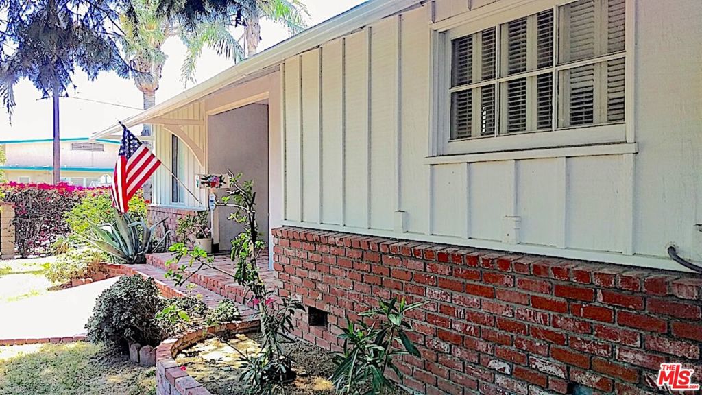 Here's a great fixer opportunity for a Lake Balboa home, near a highly-rated elementary school, with a good floor plan, and a larger, usable corner lot. The property needs work, but it has so much potential!! There is an ample backyard, a detached two-car garage with ADU potential, and a long, wide driveway, ideal for RV/boat parking or extra cars. The driveway has an electric gate. Plus, there's indoor-outdoor flow, via double French doors, from the dining area to the private backyard with a lovely arbor, patio, and hot tub. The property is surrounded by mature bougainvilleas. The primary bedroom has a three-quarter bathroom.