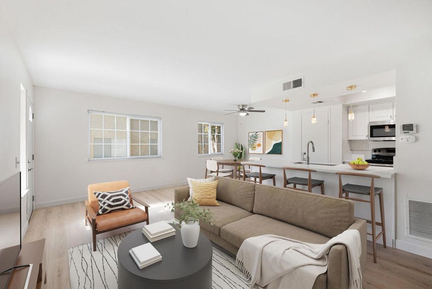 Welcome to Indian Creek Villas - perfectly located just minutes from El Paseo's world-class shopping and dining, College of the Desert, The Living Desert Zoo & Gardens, McCallum Theatre, and scenic hiking trails right outside your door. This charming two-story condo offers an open-concept living area with a stylish brick accent wall, creating a warm and inviting space. The kitchen has a newly installed dishwasher and microwave. Upstairs, you'll find two spacious bedrooms with newly installed flooring. The interior has been freshly painted and features a beautifully updated kitchen with new appliances, quartz countertops, and modern pendant lighting. The bathroom has been upgraded with a re-tiled shower tub and new vanity, plus two downstairs windows have been recently replaced. Enjoy low HOA dues that cover water, trash, earthquake insurance, exterior paint, roof maintenance, landscaping, and access to two pools and a spa. Easy freeway access makes day trips to Idyllwild or San Diego a breeze. Move-in ready and ideally located -- this is desert living at its best!