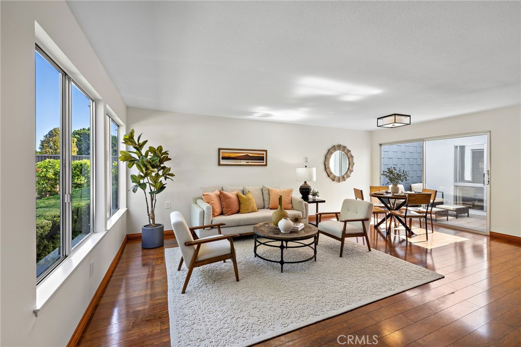 Welcome to this meticulously maintained, 2-bedroom, 1-bath home in Laguna Woods Village, one of Southern Orange County’s premier gated 55+ communities designed for active adults. This single-level, move-in ready, residence offers comfortable, STAIR-FREE living with a functional layout and indoor laundry for added convenience. Enjoy the best of California living with an extra-large private front patio and a peaceful atrium just off the dining and living area that seamlessly blends indoor and outdoor living. Laguna Woods Village offers resort-style amenities, including a 27-hole championship golf course, tennis, pickleball, bocce ball, an equestrian center, garden plots, RV parking, fitness centers, swimming pools, clubhouses, workshops, a library, a performing arts theater, and endless social clubs and activities. The HOA covers water, trash, basic cable, landscaping, and exterior maintenance, making life here as low-maintenance as it is enjoyable. And yes, you’re just 10 minutes from the world-class beaches, art galleries, and restaurants of Laguna Beach. Don’t miss the opportunity to call this warm and inviting home yours!
