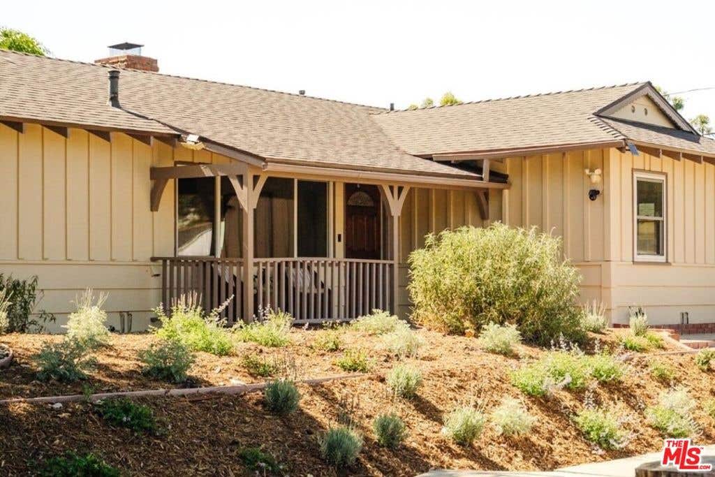 Photo of 22103 Del Valle Street, Woodland Hills, CA 91364 (MLS # 26860423)
