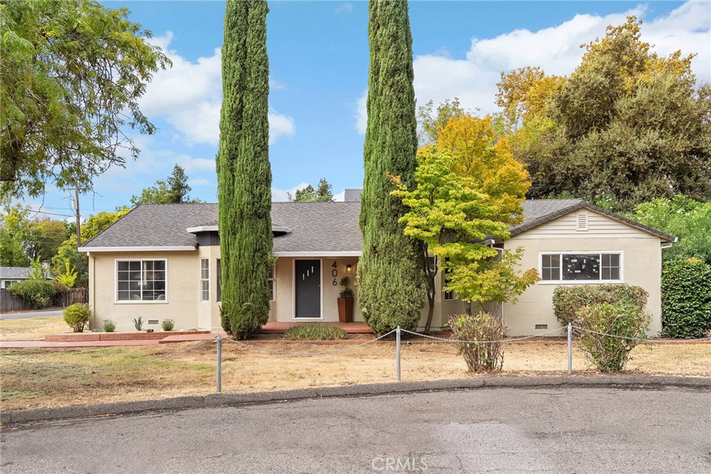 Welcome to 406 Panama Avenue! This is a one-of-a-kind property in the heart of Chico. Not only is the lot size over 1.5 acres but it comes with a quality, mid-century 2,756 square foot home that boasts 4 bedrooms, 2 bathrooms, arched doorways, hardwood floors, sunny window seats, 2 fireplaces, large laundry room, extra-large family room and the list goes on. This property is zoned Light Manufacturing which allows for business, agricultural, manufacturing uses and more. This is an ideal live-work situation for someone looking to run their business and live in a charming home all in one place! The home and yard occupy .7 acres and the remaining .81 acres is fully fenced and gated, awaiting your imagination and creativity for the multitude of uses allowed. The long paved driveway, backyard paved parking pad and attached garage offer the ideal setup for multiple vehicles, recreational vehicles, boats, trailers, and more. All combined, this is one of the most unique, in-town Chico properties to come to the market in years. Don’t miss out on this one!