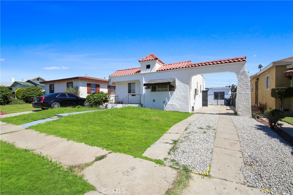 SPANISH CHARMER WITH EXTRA RENTAL INCOME FROM DETACHED ADU! Sharp and newly remodeled 4bd/2ba single family residence + 1bed/1ba detached ADU located on a terrific tree-lined street close to Downtown LA with a long driveway. Terrific curb appeal, front porch entrance, light/bright living room with fireplace, beautiful kitchen w/ custom cabinetry and quartz counters. Inside laundry room. Master bedroom w/ en-suite spacious bathroom. All four bedrooms offer ample living/closet space. Both bathrooms have been beautifully remodeled with custom cabinetry, quartz counters and custom tile and hardware. Beautiful hard wood-like flooring thru out the home with custom hardware/lighting. NEW Mini Split air conditioning system. UDA OFFERS: Separate living space from home, light/bright kitchen and bathroom, bedroom with ample living/closet space. Privately enclosed Large Back Yard with patio large grassy areas. Very private LARGE STORAGE SHED. No need to preview . . . Located in the heart of the city with convenient access to the 105 Freeway, parks, schools, shopping, and all that Los Angeles has to offer, Immaculate!