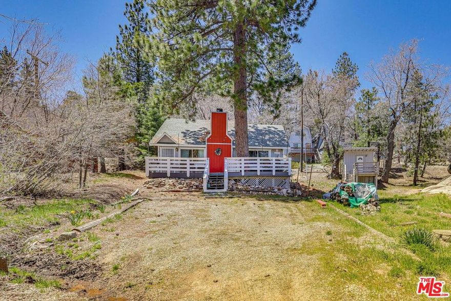 Reduced!!!! Welcome to this beautiful home, Shady Pines cabin conveniently located in the Arrowbear Lake community which is located half way between Arrowhead Lake and Big Bear Lake. The Two primary bedrooms with ensuite and a separate guest bathrooms, charming cabin has been remodeled beautifully. Just steps away from the park and Arrow bear Lake; this cute and loving home can be the perfect property for your next full-time home or vacation gets away! This cabin comes with multiple lots (51, 52, 53, 54 and 59) with over15000SF and additional outdoor storage unit with possibility of adding additional dwelling with easy parking for multiple vehicles. Property is also accessible from both Arrowbear Road with direct access to parking and lookout drive. Living room equipped with fireplace for the cozy nights with open floorplan, laminated flooring and a huge front deck to sit out and enjoy the sounds of mountain nature with view of the trees and walk to the lake. A huge separate laundry room with lots of storage space. This home is located within 10 minutes of Snow Valley slope and 20 minutes to big bear lake. Property is equipped with Tesla Charger as well.   It is also available for lease $2,500.00 a month including all furnishing as shown.
