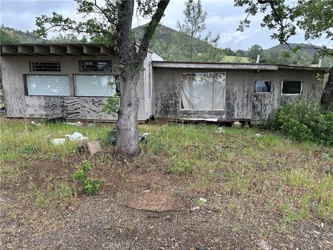 Photo of 666 Watertrough Road, Clearlake Oaks, CA 95423 (MLS # LC26069115)