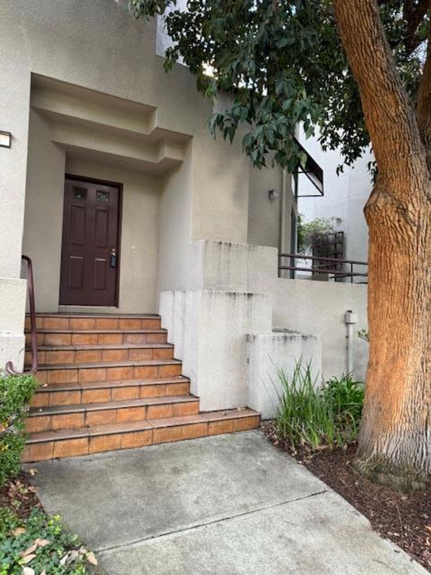 End unit townhouse with updated kitchen with quartz counters, vinyl plank flooring, newer appliances. Formal dining room. Living room with fireplace opens to balcony. Large primary bedroom with adjoining bath. 2nd bedroom on same floor with kitchen and dining. HOA has pool and clubhouse. Walk to Costco, Safeway, Metro Center and Starbucks. Washer dryer incl. double car garage with workbench and extra storage.