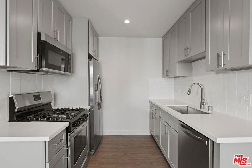 Luxurious one-bedroom, one-bathroom apartment with a private patio that is currently available.This unit features an open floor plan with high-end designer finishes, recessed lighting, and elegant floor work throughout. The kitchen is fully equipped with a stainless steel stove, refrigerator, microwave, and dishwasher. A washer and dryer are also included within the unit for your convenience.Please note that this unit does not include parking. Parking in this area can be extremely challenging to secure, so if a dedicated parking space is a requirement for you, this may not be the most suitable option.