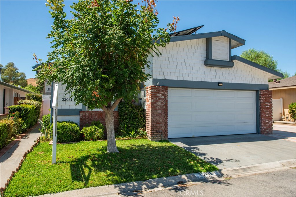 Welcome to your dream home—Feel of a gated community without the gates. Private security and neighbors who know each other and make it a safe place to live. What's special about this property: NO water bill, HOA is only $180 per month, private security, friendly and safe neighborhood, large, updated remodeled home and resort size hot tub. Deck made of long lasting pressurized wood which means easy upkeep. Great for animals as there are large parks within the community. A beautifully appointed four-bedroom, three-bath residence that provides comfort and functionality. From the moment you arrive, you’ll be captivated by curb appeal and meticulously landscaped front and rear yards. Step into a private backyard featuring a spacious open patio, with premium artificial turf -easy upkeep, ideal for outside family gatherings and inside the home you will find spacious space because of the open concept floor plan. Inside, the home offers spacious rooms, with engineered hardwood flooring throughout the whole home. All windows upgraded to double pane energy efficient windows, recessed LED lighting throughout the house. New Hot Water Heater, replaced July 25, 2025. The two-car garage provides ample room for vehicles, EV ready, with large wall to wall and ceiling storage units. Kitchen completely remodeled, cherry wood cabinets, beautiful granite counter tops, all stainless steel appliances. Completely remodeled all 3 full bathrooms. A cost-saving solar system enhances the home’s efficiency without compromising style. Located in the sought-after Stonegate community, residents enjoy access to exclusive amenities including a resort-style pool and spa, fitness center, clubhouse, RV and boat storage, and scenic walking trails—all just moments from the beauty of Castaic Lake. Don’t miss the opportunity to make this your new home