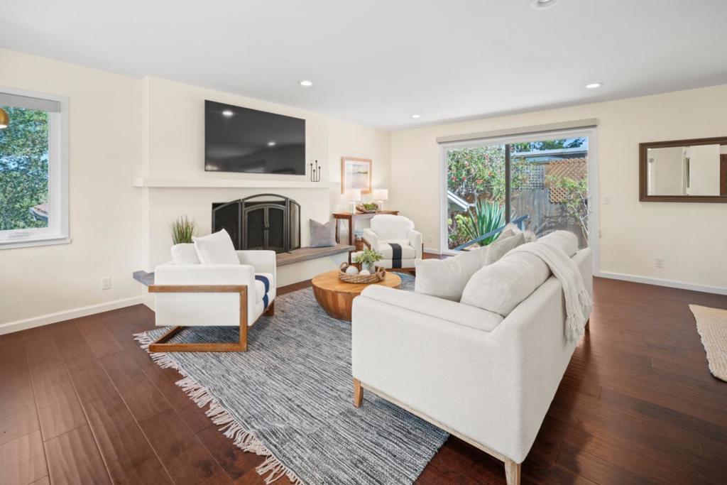 Welcome to this light and bright contemporary Carmel cottage, offering the perfect combination of coastal charm and modern convenience. This beautifully designed home features 3 spacious bedrooms and 3 full bathrooms with 1,667 sq.ft. of thoughtfully designed living space. Situated on a crowned 8,700 sq.ft. lot, the home provides privacy, tranquility, and a low-maintenance yard ideal for relaxed outdoor living and entertaining. The open-concept living, dining and kitchen glow with natural light, enhanced by large sliding glass doors that invite the outdoors in. The modern kitchen is features sleek countertops, stainless steel appliances, and ample cabinetryperfect for both casual family meals or entertaining. The primary suite offers an ensuite bathroom with double sinks, a large shower, and a walk-in closet. Two additional bedrooms provide flexible space for family, guests, or a home office, while the additional bathrooms are updated with contemporary finishes. Located just minutes from charming downtown Carmel shops, world-class restaurants, and the breathtaking Carmel Beach! Easy access also provided to HWY 1 for navigating down the Big Sure Coast, into Monterey, Pacific Grove or Pebble Beach to enjoy all that the Monterey Peninsula has to offer.