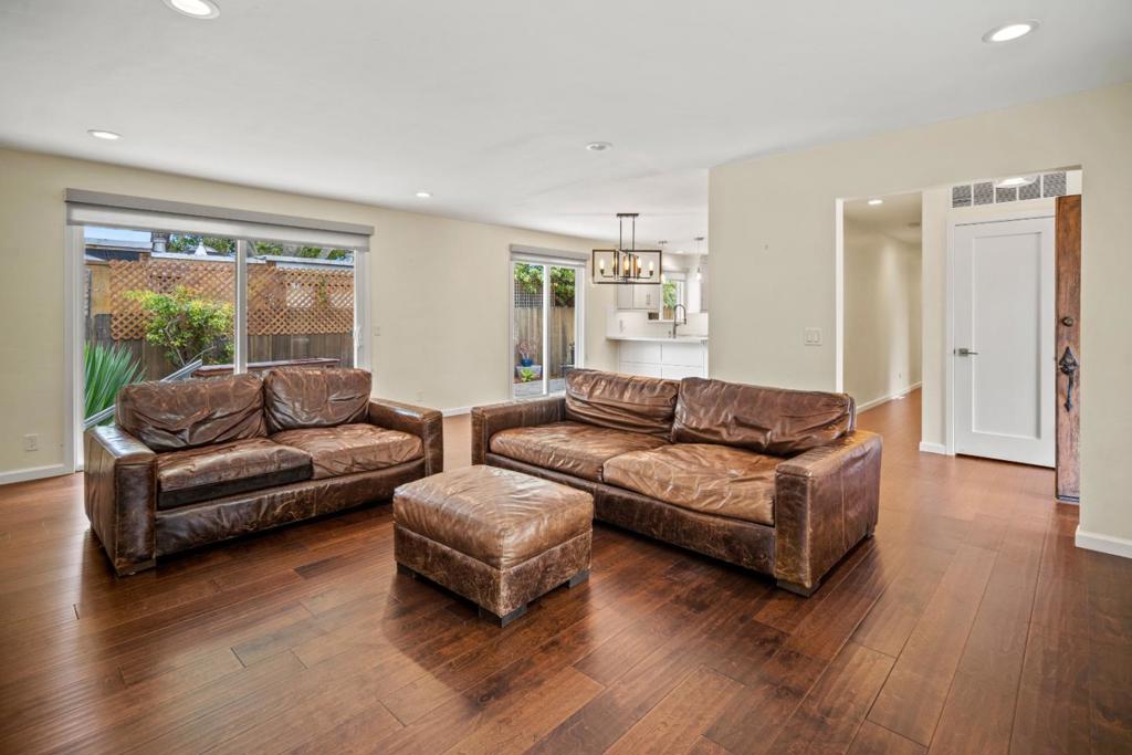 Welcome to this light and bright contemporary Carmel cottage, offering the perfect combination of coastal charm and modern convenience. This beautifully designed home features 3 spacious bedrooms and 3 full bathrooms with 1,667 sq.ft. of thoughtfully designed living space. Situated on a crowned 8,700 sq.ft. lot, the home provides privacy, tranquility, and a low-maintenance yard ideal for relaxed outdoor living and entertaining. The open-concept living, dining and kitchen glow with natural light, enhanced by large sliding glass doors that invite the outdoors in. The modern kitchen is features sleek countertops, stainless steel appliances, and ample cabinetryperfect for both casual family meals or entertaining. The primary suite offers an ensuite bathroom with double sinks, a large shower, and a walk-in closet. Two additional bedrooms provide flexible space for family, guests, or a home office, while the additional bathrooms are updated with contemporary finishes. Located just minutes from charming downtown Carmel shops, world-class restaurants, and the breathtaking Carmel Beach! Easy access also provided to HWY 1 for navigating down the Big Sure Coast, into Monterey, Pacific Grove or Pebble Beach to enjoy all that the Monterey Peninsula has to offer.