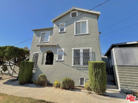 Photo of 3381 S Gramercy Place, Los Angeles, CA 90062 (MLS # 26636149)