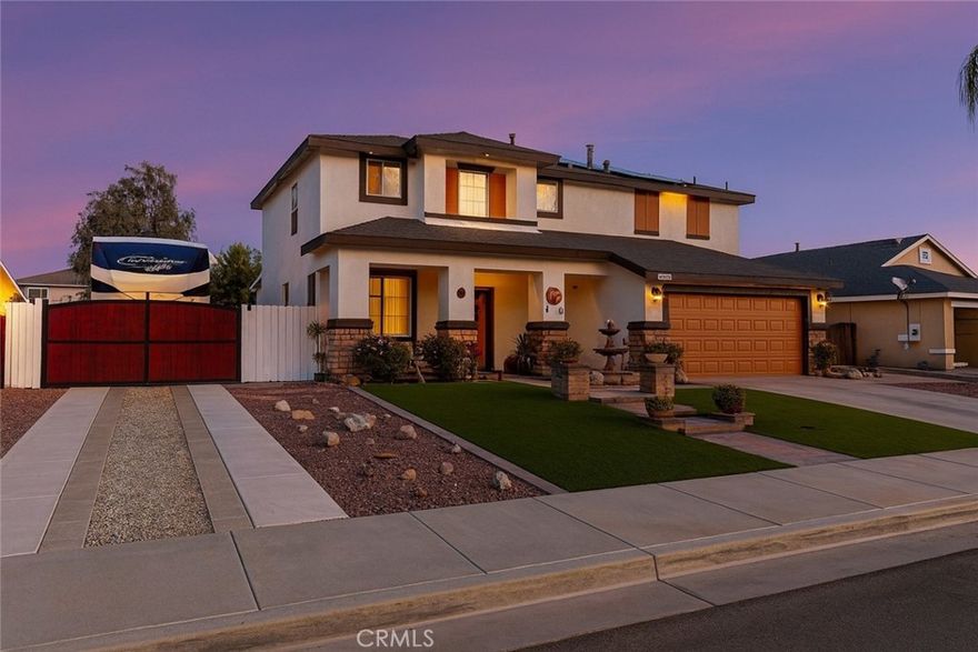 Welcome to a home designed for gatherings and good times! From the moment you enter, the living spaces flow easily to the backyard, creating a seamless indoor/outdoor experience ideal for weekend barbecues, game days, and celebrations. The rear yard features an outdoor bar area perfect for serving drinks and appetizers, plus a dedicated dog kennel to keep four-legged family members comfortable and secure.



Need space for your toys? Enjoy true RV parking with power and water hook-ups (no sewer)—bring the trailer, boat, or coach. The home also includes solar panels to help keep your energy bills low while you live comfortably year-round. Thoughtful touches, low-maintenance landscaping, and ample patio space make entertaining effortless.



The home itself features all of the bedrooms upstairs with an en-suite featuring a separate shower/tub. The upstairs landing has plenty of room for a space to relax and unwind. 



Convenient Hemet location close to everyday essentials and area amenities. This one checks the boxes for lifestyle, efficiency, and fun—come see why this home was made for entertaining!