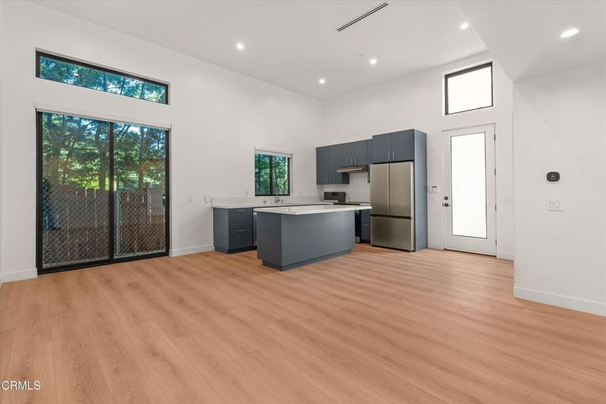Be the first to live in this thoughtfully designed 1 bed, 1 bath modern ADU located in Glassell Park. A dedicated entry offers privacy and security, while the spacious layout and architectural design create an inviting, functional space. Featuring double-height ceilings and clerestory windows, the atmosphere is airy and bright. The kitchen has quartz counters, European-style cabinetry and a large island with bar seating, complemented by a suite of stainless steel appliances. Solar panels provide energy efficiency/savings and multiple ethernet ports allow you to stay connected whether you are working from home or streaming. Additional features include in-unit laundry and a shared yard. If you are looking for great design, quality finishes and a retreat from the city this space is for you! Near Loquat Coffee, Barra Santos, The Heights Deli and other local hot spots in Highland Park, Eagle Rock and Frogtown!