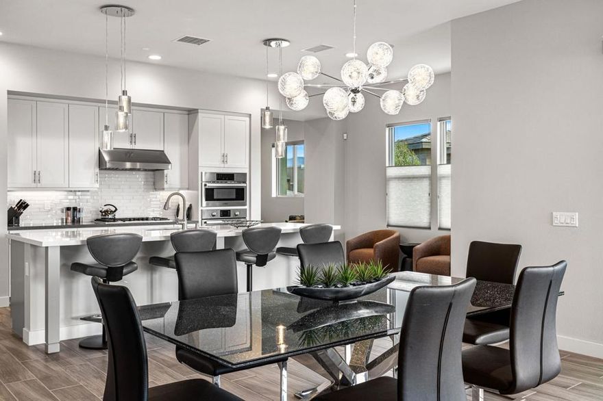 Palm Desert | The Retreat at Desert Willow - Residence Four - Enclave Model | South-Facing Mountain Views - Welcome to The Retreat at Desert Willow -- the epitome of desert luxury living. This rarely available Residence Four Enclave has been gently lived in part-time and is ideally situated on the premier south side of the community, capturing panoramic mountain views. Step inside your private-elevator-accessed penthouse, the largest floor plan offered, spanning nearly 2,600 sq. ft. with 3 bedrooms and 3 bathrooms. A true indoor-outdoor experience awaits with dual retractable glass sliders opening to an impressive 600-sq.-ft. wraparound veranda -- complete with a sleek fireplace and multiple seating and dining areas, all framed by dramatic mountain vistas. Inside, elegance meets functionality with porcelain plank flooring, surround sound throughout, and a chef's kitchen featuring Bosch stainless-steel appliances, a wine refrigerator, custom tile backsplash, and quartz countertops. Modern light fixtures, recessed lighting, and designer window coverings complement every space. Additional upgrades include a whole-home water softener, epoxy-finished garage with custom storage, tankless water heater, and more. As a resident of The Retreat, you'll enjoy exclusive membership to Desert Willow Golf Club, included with HOA dues -- plus access to resort-style amenities and a sophisticated, low-maintenance lifestyle. Welcome home to The Retreat -- where elevated living meets effortless luxury.