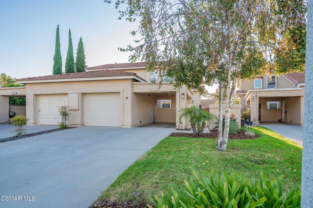 If you've been waiting for a sign to buy--this is it! This beautifully upgraded 3-bedroom, 2.5 home is tucked away on a quiet Moorpark cul-de-sac. Inside, thoughtful upgrades and inviting finishes make this home truly move-in ready. On the main level you'll find wood-like flooring, a spacious living room with vaulted ceilings, and a white-washed brick fireplace with custom wood mantle. The open-concept kitchen shines with quartz counters, shaker cabinets, stainless steel appliances, a gas stove, and breakfast bar--perfect for entertaining. The dining area features a charming shiplap accent wall and sliding doors that open to the backyard.Step outside to enjoy your own private outdoor haven with new landscaping and a large patio space. A charming flagstone walkway connects the backyard to the front courtyard for added ease and functionality.Upstairs, the primary suite boasts a fully remodeled bathroom with dual sinks, marble counters, abundant storage, and a stunning custom-tiled shower. Two additional bedrooms and a remodeled full bath complete the second floor.Extra features include an enclosed laundry area with direct access to the kitchen and garage, crown molding, recessed lighting, central A/C, low HOA, plus an attached single car garage with carport. Located in the highly sought-after Heather Glen community, you'll be just minutes from shopping, dining, beautiful parks, and top-rated schools--everything Moorpark living has to offer.Don't miss this fantastic opportunity to make this home yours!