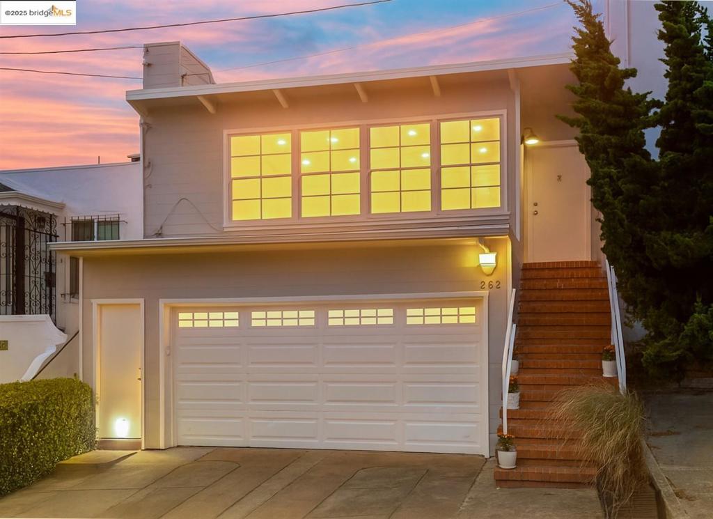 Imagine waking up each morning to stunning ocean views from your bedroom at 262 Byxbee St. Envision yourself savoring a cup of coffee in the tranquil backyard or hosting gatherings in the mid-century modern living room that boasts ocean views and an abundance of natural light. The home includes a spacious side-by-side garage. Situated in the vibrant Merced Heights, it offers a perfect blend of community charm and city convenience.