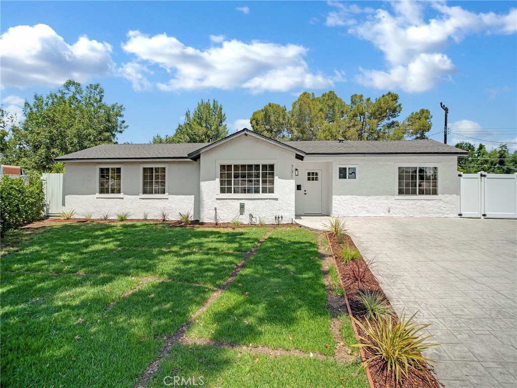 This truly exceptional property has been thoughtfully reimagined from the ground up, offering the perfect blend of modern luxury, functional design, and endless potential on a generous ½-acre lot. Ideally situated in the heart of Thousand Oaks, this beautifully renovated single-story home situated in a cul-de-sac sets a new standard for contemporary living. This home has been extensively upgraded with a brand-new roof, fully copper plumbing, and a newly plastered pool. Inside, you’ll find smooth-finish drywall, designer lighting, and high-end finishes throughout. The open-concept floor plan flows effortlessly, highlighting natural light and a timeless design. At the center of the home is a chef-inspired kitchen equipped with new appliances. The oversized quartz island and countertops, which offer seating, storage, are ideal for both everyday living and entertaining. Wide-plank laminate hardwood flooring runs throughout the home, complemented by sleek interior doors and thoughtfully designed bathrooms that feel like a spa retreat. The garage has been converted, creating an expansive and sun-filled primary suite that adds incredible value and flexibility. Step outside to a backyard built for both relaxation and possibility. Enjoy wide gated RV access and a deep driveway that runs to the back of the property, perfect for future additions, recreational storage, or custom builds. The large backyard is anchored by a sparkling, newly plastered pool, with ample space to create your dream outdoor oasis. Featuring six bedrooms and three modern bathrooms, this home offers flexibility for multigenerational living, a home office setup, or an income-generating ADU opportunity two of the bedrooms and one bathroom can easily be converted to a separate guest unit. There is no garage, but the large lot offers plenty of space to build one if desired and is conveniently located just minutes from Thousand Oaks High School, the 23 Freeway, Trader Joe’s, Gelson’s, The Oaks Mall, and some of the area’s top-rated schools and amenities. This rare, move-in-ready gem won’t last long. Experience the lifestyle, space, and value this extraordinary home offers. Schedule your private tour today!