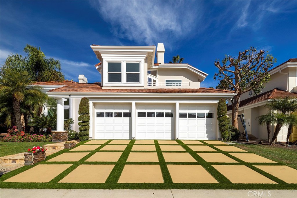 Discover timeless elegance in this recently updated residence, nestled within the exclusive, gated enclave of Harbor Pointe in Corona del Mar.This coastal sanctuary epitomizes refined seaside living. Positioned directly across from the renowned Fashion Island, indulge in unparalleled access to world-class shopping, dining, and entertainment, while being moments from Big Canyon Country Club, John Wayne Airport, Newport Harbor, pristine beaches, and the iconic allure of Newport Beach. This distinguished home features three en-suite bedrooms, each with a private bath, complemented by an additional powder room for guests. Designed with both intimacy and entertaining in mind, the residence boasts expansive living areas, a formal dining room, and office. The chef’s kitchen is a culinary masterpiece, showcasing custom cabinetry, stone countertops, and an airy breakfast nook with views of the private back yard. The master retreat is a haven of serenity, offering a spa-like bath with stone finishes, a generous walk-in closet, and the utmost privacy. The beautifully landscaped grounds extend the living space outdoors, with tranquil pool and spa areas harmonizing with mature greenery and thoughtful hardscaping. Additional features include a three-car garage laundry and ample storage spaces. This exceptional property must be experienced firsthand to fully appreciate the quality and meticulous craftsmanship that defines it.