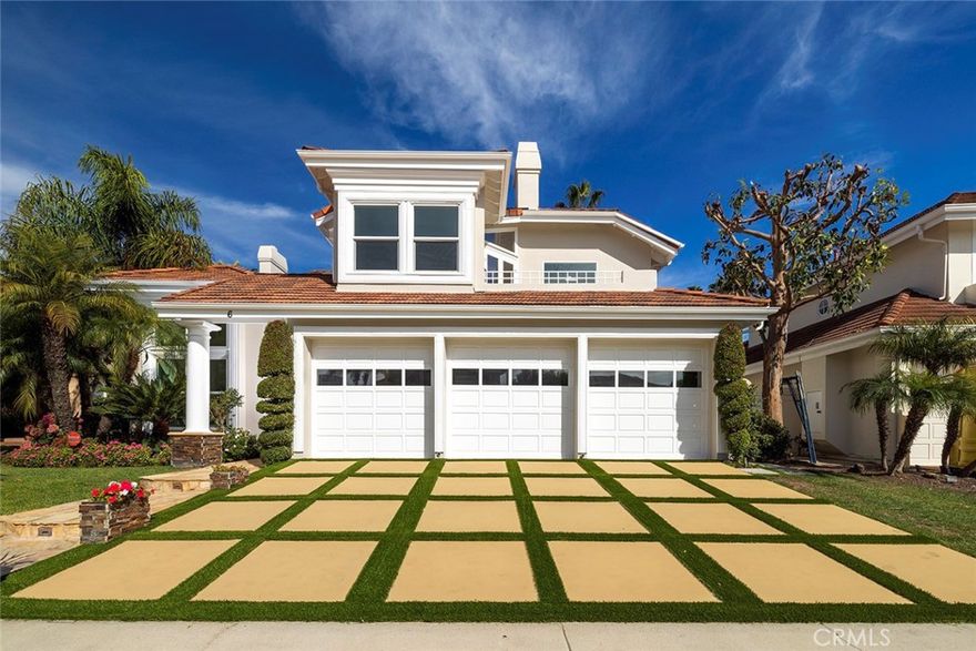 Discover timeless elegance in this recently updated residence, nestled within the exclusive, gated enclave of Harbor Pointe in Corona del Mar.This coastal sanctuary epitomizes refined seaside living. Positioned directly across from the renowned Fashion Island, indulge in unparalleled access to world-class shopping, dining, and entertainment, while being moments from Big Canyon Country Club, John Wayne Airport, Newport Harbor, pristine beaches, and the iconic allure of Newport Beach. This distinguished home features three en-suite bedrooms, each with a private bath, complemented by an additional powder room for guests. Designed with both intimacy and entertaining in mind, the residence boasts expansive living areas, a formal dining room, and office. The chef’s kitchen is a culinary masterpiece, showcasing custom cabinetry, stone countertops, and an airy breakfast nook with views of the private back yard. The master retreat is a haven of serenity, offering a spa-like bath with stone finishes, a generous walk-in closet, and the utmost privacy. The beautifully landscaped grounds extend the living space outdoors, with tranquil pool and spa areas harmonizing with mature greenery and thoughtful hardscaping. Additional features include a three-car garage laundry and ample storage spaces. This exceptional property must be experienced firsthand to fully appreciate the quality and meticulous craftsmanship that defines it.