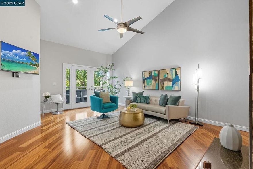 Stylish top-floor, single-level condo in the desirable San Miguel HOA just steps from Broadway Plaza and the Iron Horse Trail. Offering 1,548 sq ft with vaulted ceilings and hardwood floors, this 2 bedroom, 2.5 bath home combines modern updates with a mid-century vibe. With dramatic ceiling height and a striking slate fireplace, the family room is filled with natural light from French doors that open to a private deck. An adjoining dining area with wet bar creates the perfect space for entertaining, while the eat-in kitchen showcases quartz counters, a marble tile backsplash, a coffee bar station, and a walk-in pantry. The expansive primary suite includes a bonus space for a home office, a private deck, and a luxurious bathroom with dual sinks, an oversized shower, and abundant built-in storage. A second bedroom with vaulted ceilings is complete with a nearby full bath. A stylish half bath adds convenience for guests. Additional highlights include an in-unit washer/dryer, two assigned parking spaces in the gated garage, and access to the community pool and spa. Daily conveniences are close at hand, with Safeway just a block away, along with shopping, dining, and the Iron Horse Trail. Lifestyle living at its best in the heart of Walnut Creek.