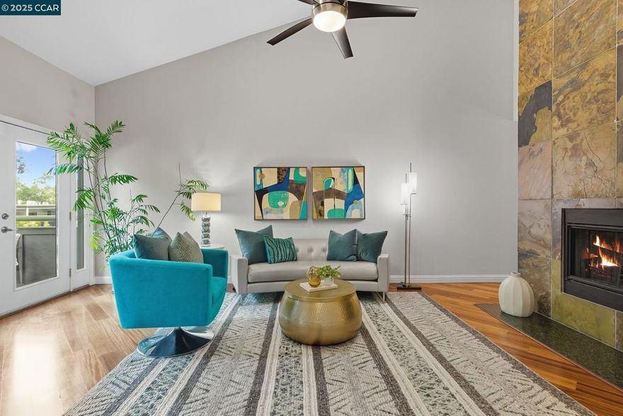 Stylish top-floor, single-level condo in the desirable San Miguel HOA just steps from Broadway Plaza and the Iron Horse Trail. Offering 1,548 sq ft with vaulted ceilings and hardwood floors, this 2 bedroom, 2.5 bath home combines modern updates with a mid-century vibe. With dramatic ceiling height and a striking slate fireplace, the family room is filled with natural light from French doors that open to a private deck. An adjoining dining area with wet bar creates the perfect space for entertaining, while the eat-in kitchen showcases quartz counters, a marble tile backsplash, a coffee bar station, and a walk-in pantry. The expansive primary suite includes a bonus space for a home office, a private deck, and a luxurious bathroom with dual sinks, an oversized shower, and abundant built-in storage. A second bedroom with vaulted ceilings is complete with a nearby full bath. A stylish half bath adds convenience for guests. Additional highlights include an in-unit washer/dryer, two assigned parking spaces in the gated garage, and access to the community pool and spa. Daily conveniences are close at hand, with Safeway just a block away, along with shopping, dining, and the Iron Horse Trail. Lifestyle living at its best in the heart of Walnut Creek.