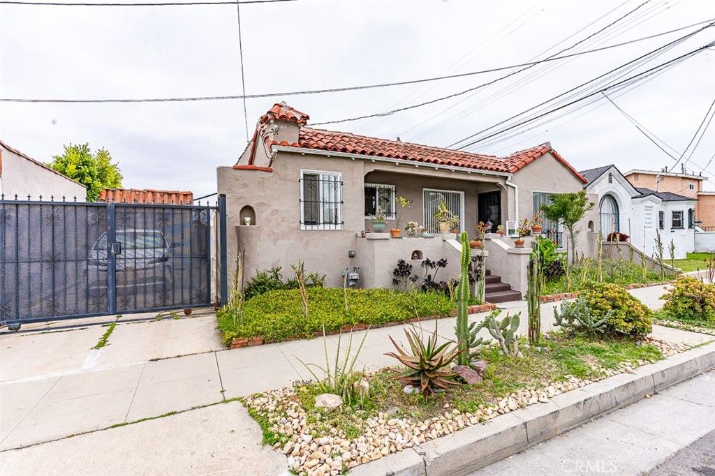 Photo of 8462 S Denker Avenue, Los Angeles, CA 90047 (MLS # PW25102036)