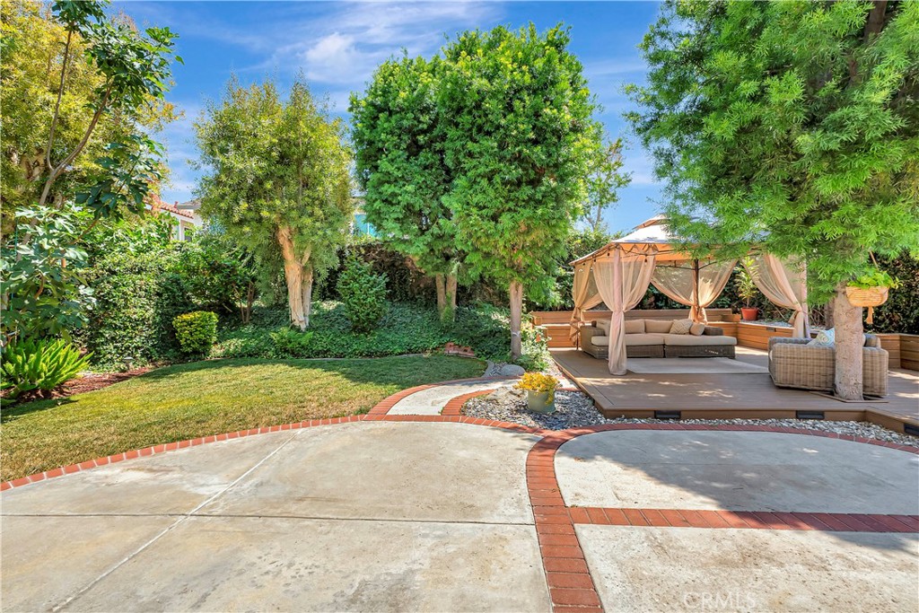 Tranquil living in the most desirable area of Irvine , ideally situated at the end of a quiet cul-de-sac—just steps from the community pool & spa, and the famous Santiago Hills Elementary School which offers one of the six APPAS programs in Irvine school district. This beautifully remodeled home features a spacious kitchen with large island, oversized yard with a raised weatherproof deck, built-in seating & lighting and an outdoor shower. Newer dual A/C units and heater. Dual pane windows with safety explosion-proof film. HOA offers a junior Olympic-size pool, huge spa, two tennis courts, tot pool, tot lot, BBQ areas, clubhouse, and a sand volleyball court. Close proximity to shopping, UC Irvine, freeways, and beaches.