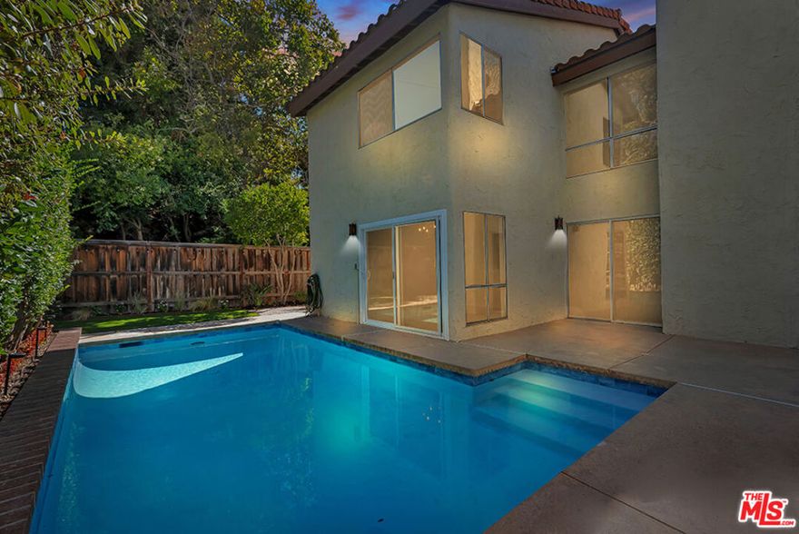 Discover an exceptional investment opportunity with this charming 3-bedroom plus loft, 2.5-bathroom townhome situated in the desirable community of Thousand Oaks. Within Racquet Club Villas, comprising of 264 townhomes, only four boast private pools, and this is one of them. This home seamlessly blends comfort and style, featuring modern amenities such as a contemporary kitchen with NEW stainless steel appliances and a spacious living area complete with a cozy fireplace, perfect for both entertaining and relaxing evenings. Vaulted ceilings and new paint through out. Step outside to a private oasis featuring a stunning remodeled pool and updated equipment and an inviting patio, ideal for relaxation or social gatherings. The expansive backyard is perfect for pets, and the patio offers a tranquil space for enjoying morning coffee or evening sunsets. Added conveniences such as an in-unit NEW Washer/Dryer enhance the ease of living. Conveniently located in Thousand Oaks, known for its scenic beauty and secure neighborhoods, this property is situated near popular destinations, including The Oaks Mall, offering a variety of shopping experiences.