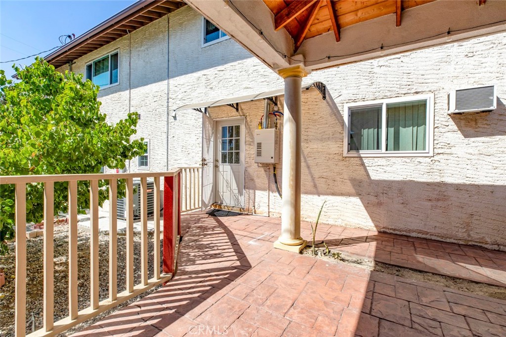 Welcome to this charming 1-bedroom, 1-bath ADU in the heart of Tujunga. As you step inside, you'll be welcomed by the warm glow of recessed lighting and stylish laminated hardwood flooring throughout. The kitchen is a standout feature, offering ample cabinetry and elegant granite countertops, perfect for both everyday meals and special occasions. The spacious bedroom is designed for comfort and convenience, featuring generous closet space to accommodate all your storage needs. The bathroom is thoughtfully equipped with dual sinks, making morning routines a breeze. Step outside to enjoy the covered backyard patio gazebo, an ideal spot for relaxation or entertaining guests. The property also includes convenient two-car driveway parking and a separate entrance for added privacy. One small pet is welcome! Located close to shops, restaurants, and schools, this ADU offers both comfort and convenience in a vibrant community. *Only washer included