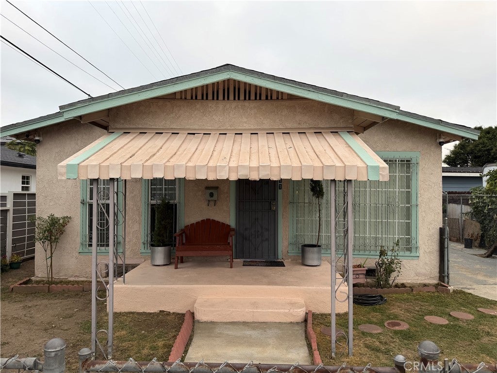Photo of 611 W 65th ST, Los Angeles, CA 90044 (MLS # RS26213263)