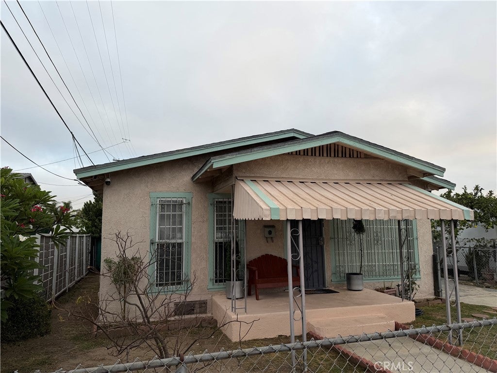 Photo of 611 W 65th ST, Los Angeles, CA 90044 (MLS # RS26213263)