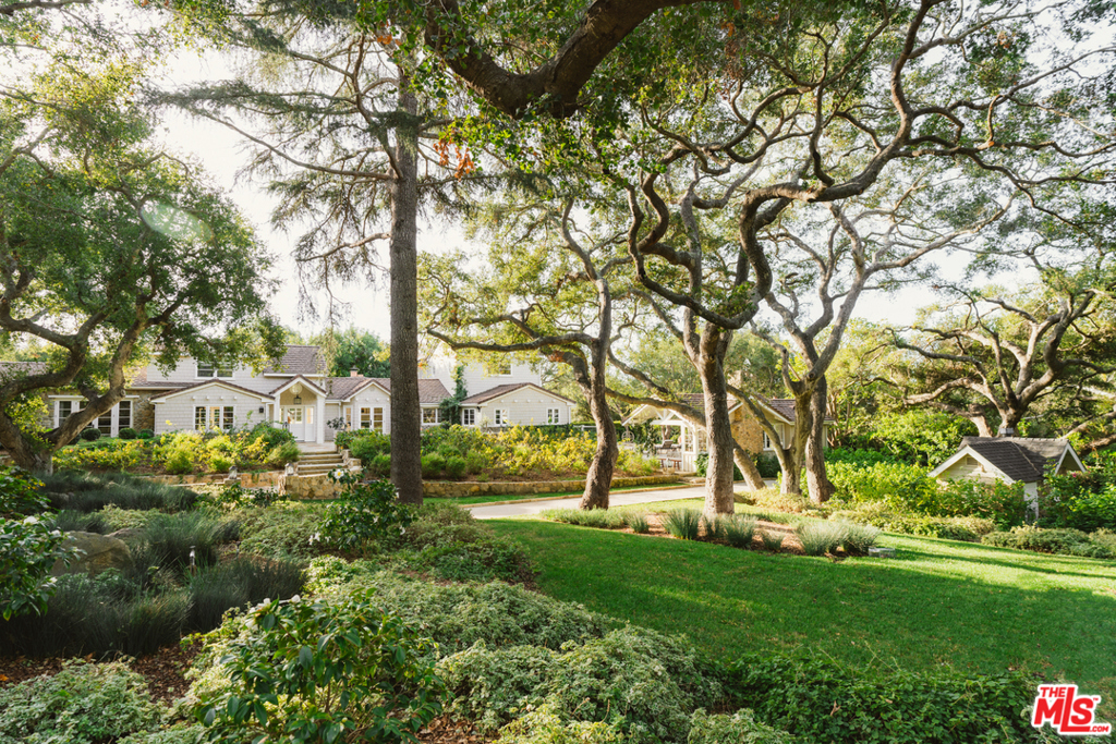 Tucked under magical oaks is this idyllic Montecito estate - a storybook dreamland, both inside and out. The ultimate compound property is situated on a sprawling 1.71 acres, designed for relaxation and entertainment alike. The main house, a predominantly single-level floor plan, boasts 3 bedroom suites at opposite ends of the home, each with an en suite bathroom and walk-in closet. Rebuilt in 2015 with the highest quality amenities, the beautiful interiors bring the outdoors in, with a nod to a San Ysidro Ranch aesthetic. Meticulously designed gardens by Eric Nagelmann. Charming additional structures: a guest cottage, separate gym/art studio, pool cabana, as well as a bocce court, koi pond, and chicken coop. Situated within MUS this abundant property is certainly unforgettable!