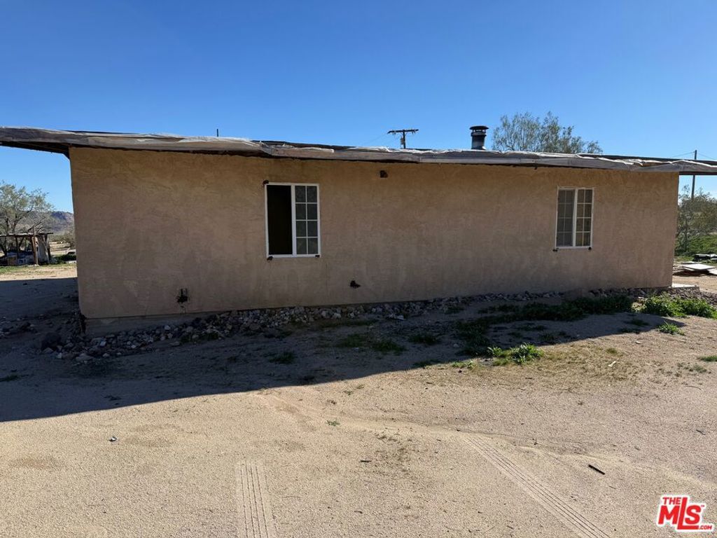 Photo of 3475 Kickapoo Trail, Landers, CA 92285 (MLS # 26637843)