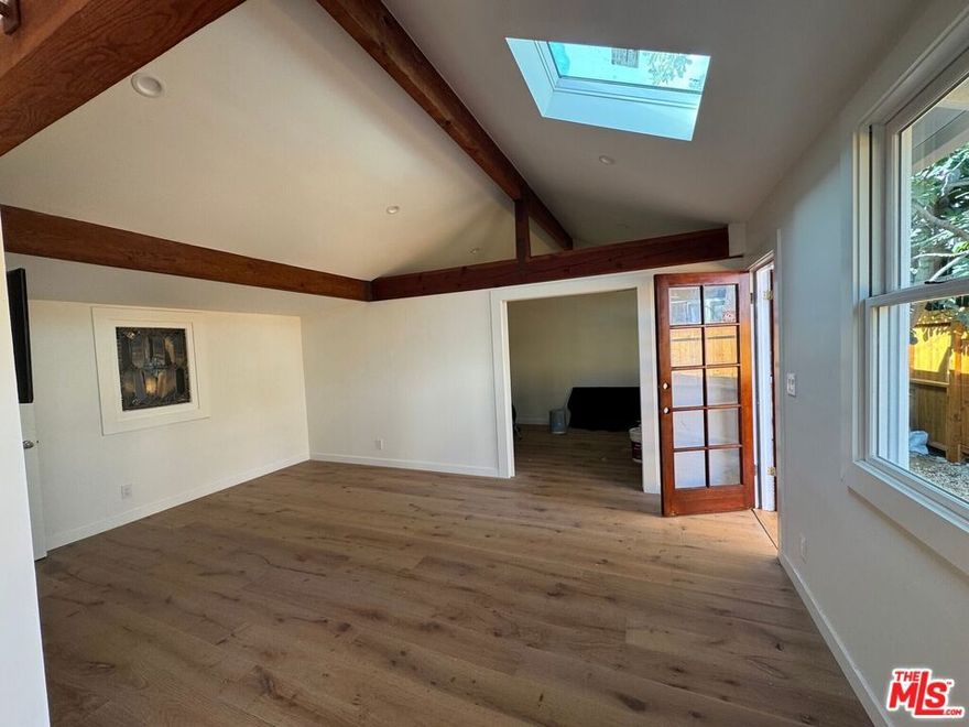 Nestled into the heart of Los Feliz, is a hidden cottage offering a person or couple their perfect home. This 1920s back house, with a private entrance, secluded patio, and gated parking, provides you with an oasis close to Los Feliz Village, Barnsdall Arts Park and Griffith Park. The home has been fully renovated, balancing vintage character with fresh updates. You'll find the simple luxuries that matter most: in-unit washer/dryer, central air for the hot days, and brand new appliances. This isn't just a rental. It's your own dog-friendly hideaway, perfectly in tune with the laid-back, creative rhythm of Los Feliz.